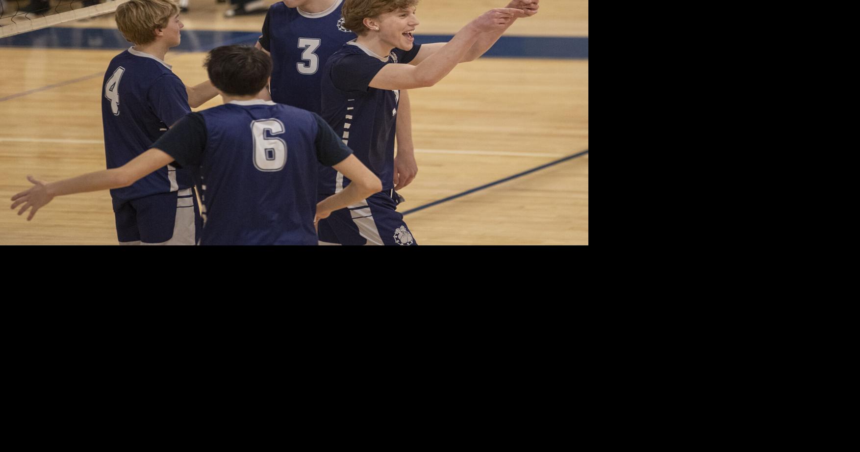 Westerly’s Henry Kenyo, right, and teammates celebrate after scoring the 24th point in game 3 against Pilgrim at Westerly in boys’ volleyball