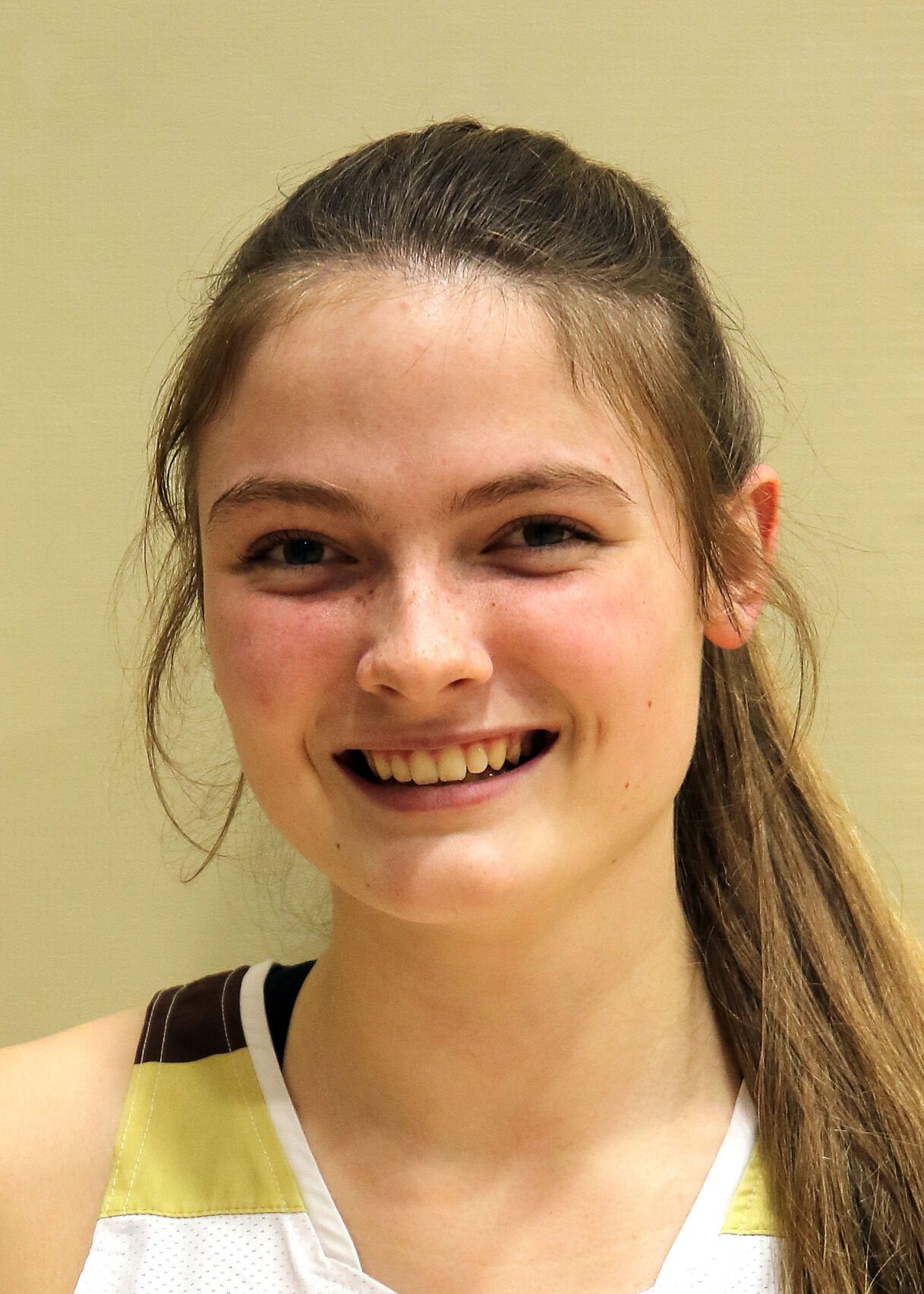 Stonington Girls’ Basketball Team Triumphs over Guilford with 65-57 Victory