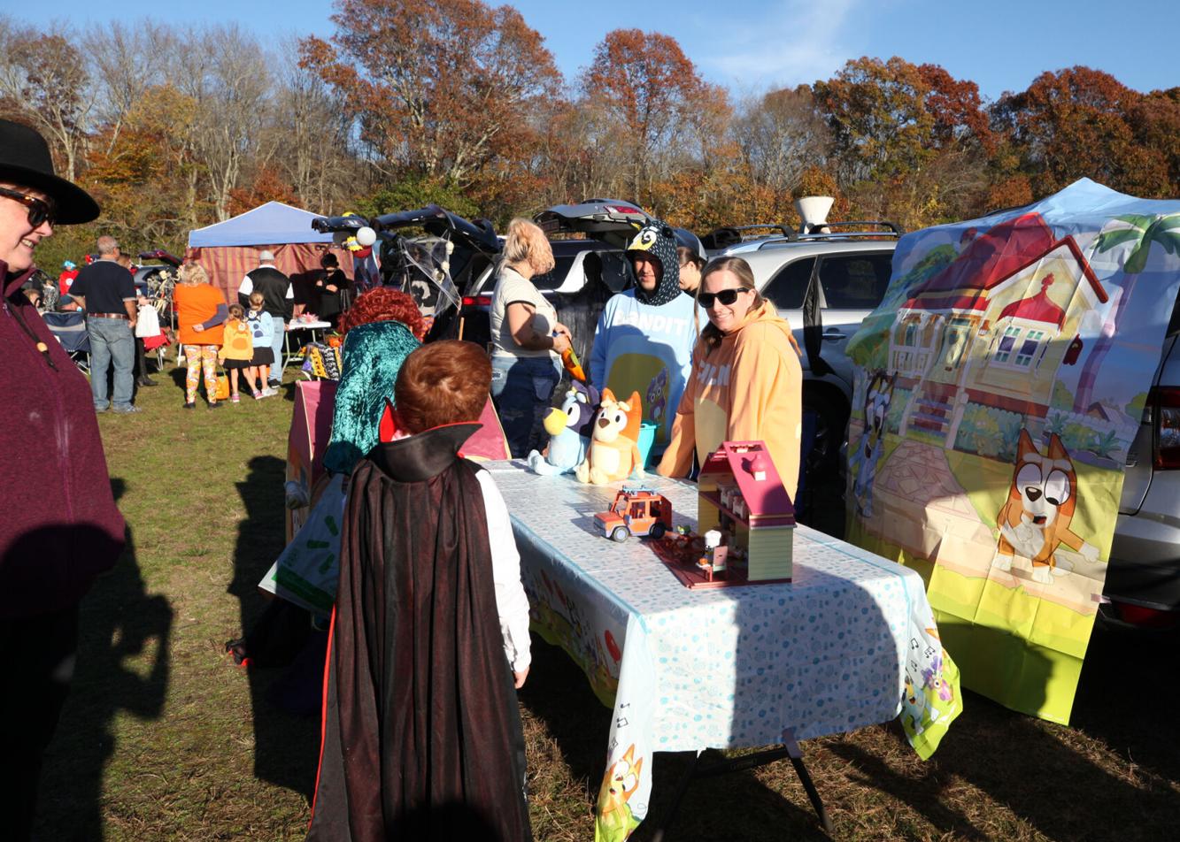 halloween-consumed-children-await-their-turn-to-grab-their-favorite