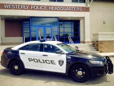 standing Westerly Police Department Cruiser