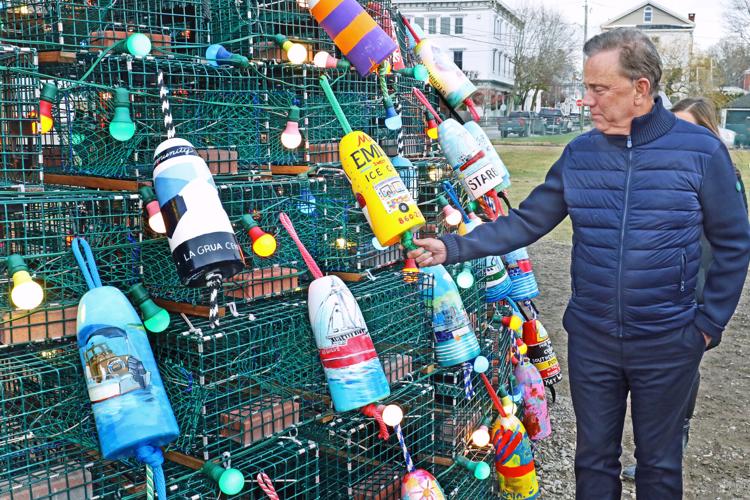 Building holiday spirit Town dock’s lobster trap tree shines a