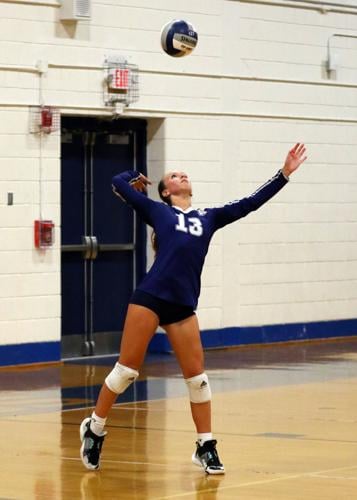 Westerly junior Summer Bruno (13) serves during the third set of the Westerly Bulldogs vs Mt. Hope Huskies EIIL Division-II girls varsity volleyball game played Wednesday evening, September 21, 2022 at Westerly High School’s Federico Gymnasium, Westerly...