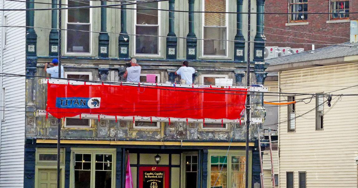 PHOTOS: Scraping the years off a downtown building | News ...