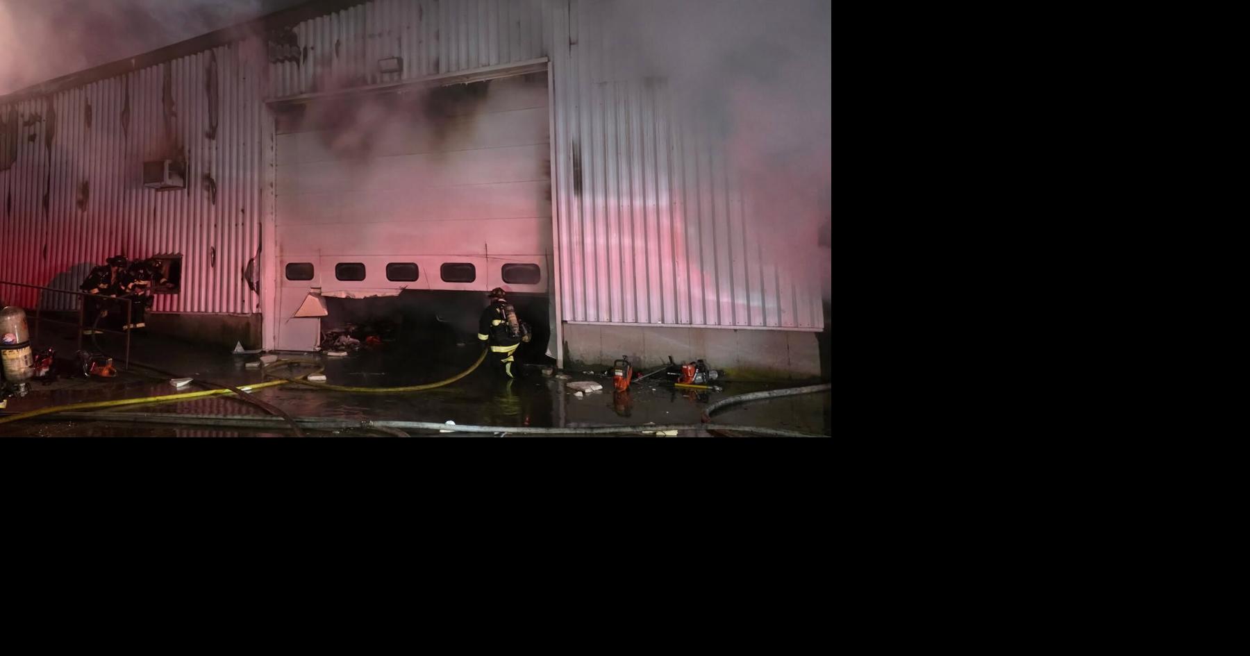Firefighters battle large structure fire in North Stonington commercial ...