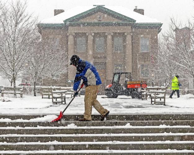 PHOTOS: Late-season storm blankets region with some early April snow ...