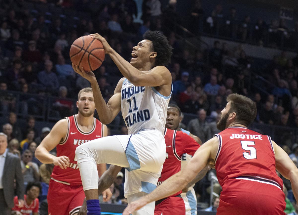 College Basketball Rhody Veterans Come Through In Overtime