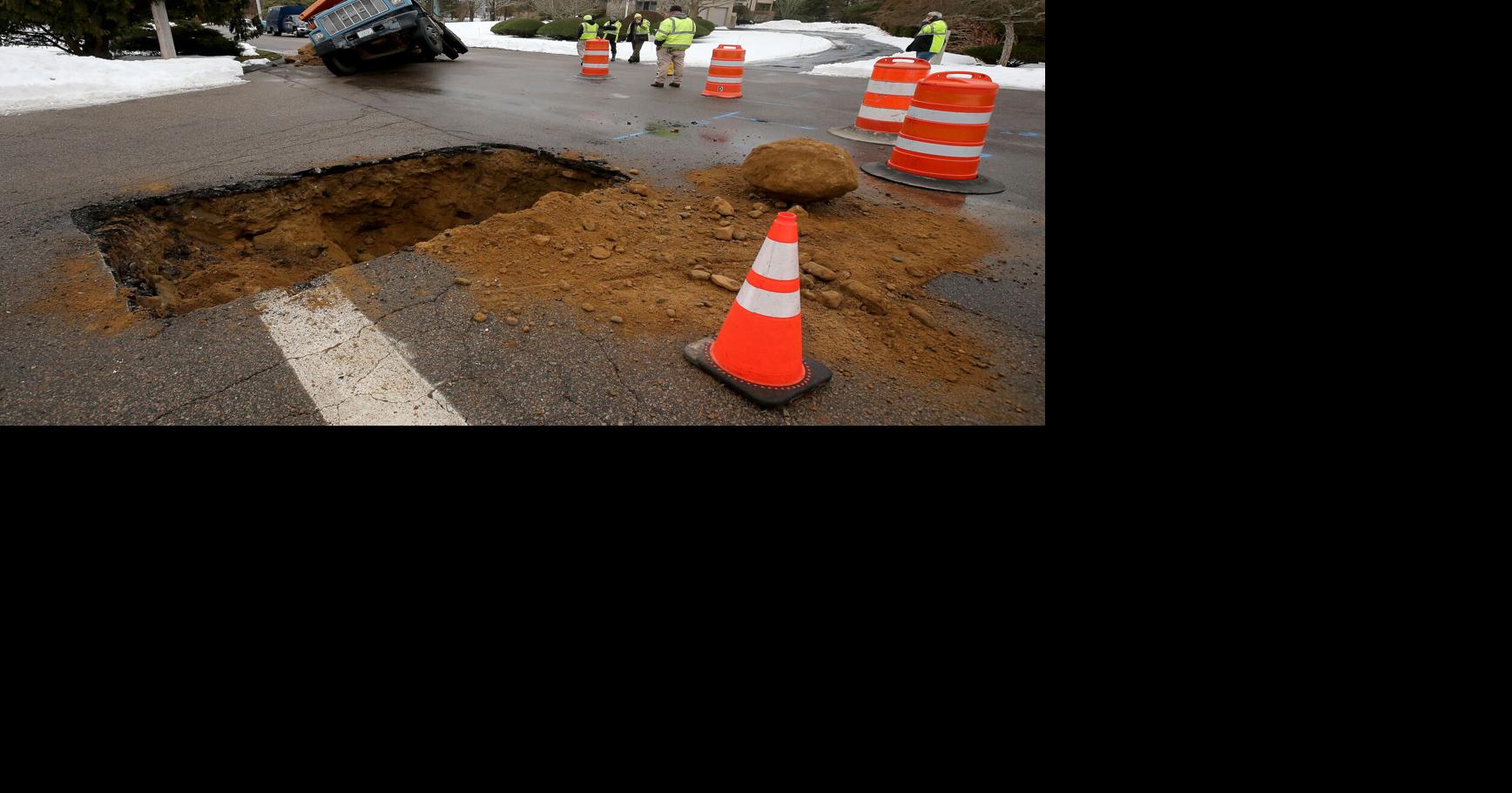 PHOTOS: Double trouble at the water main break on Valley Drive ...