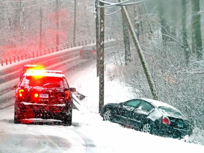 PHOTOS: Late-season storm blankets region with some early April snow ...