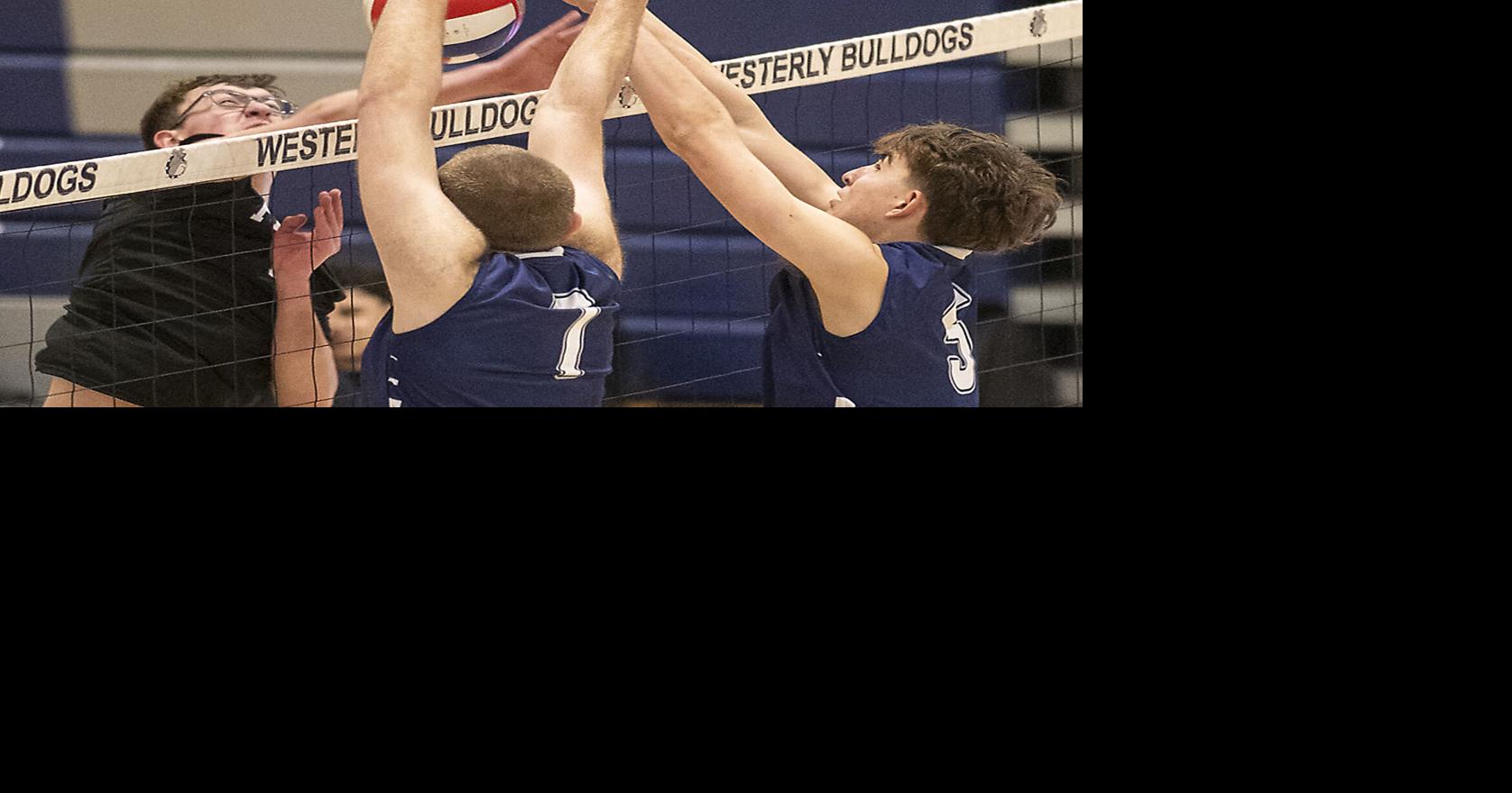 Pilgrim at Westerly’s Nate Paciga (7) and teammate Asa Mayo, right, block a shot by Pilgrim