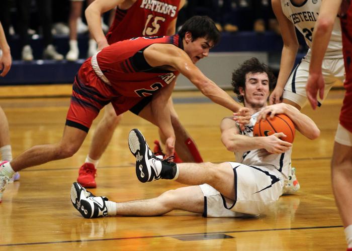 Griffin Aldrich (32) grabs a loose ball for Westerly