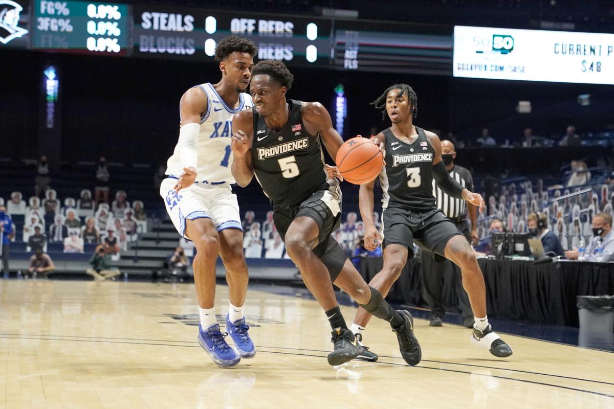 College basketball: Friars fall in final second against ...