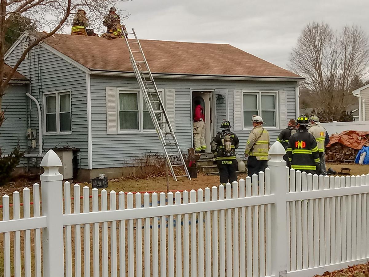 PHOTOS Chimney fire quickly extinguished on Hewitt Road in Mystic