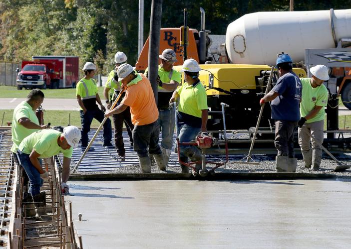 PHOTOS: Cross court winner: Stonington tennis courts get a new surface
