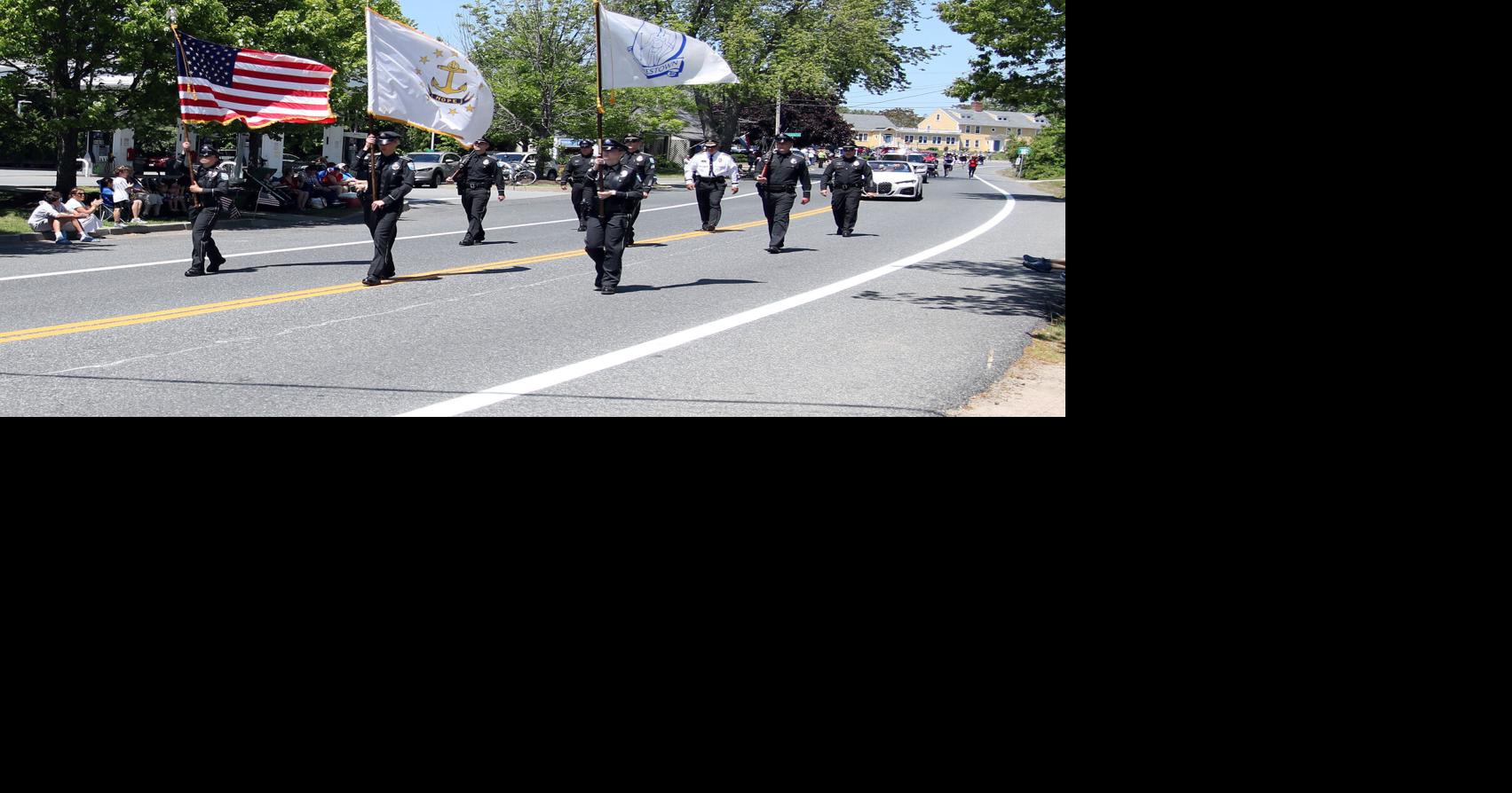 The Charlestown Police Color Guard lead off the parade down Old Post