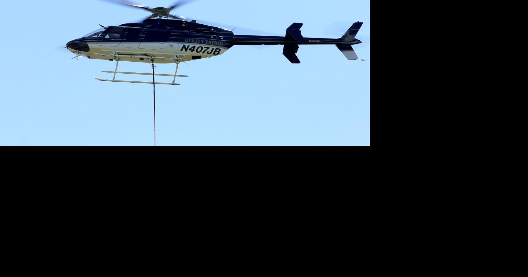 PHOTOS Helilogging to remove old power poles in Mystic Stonington