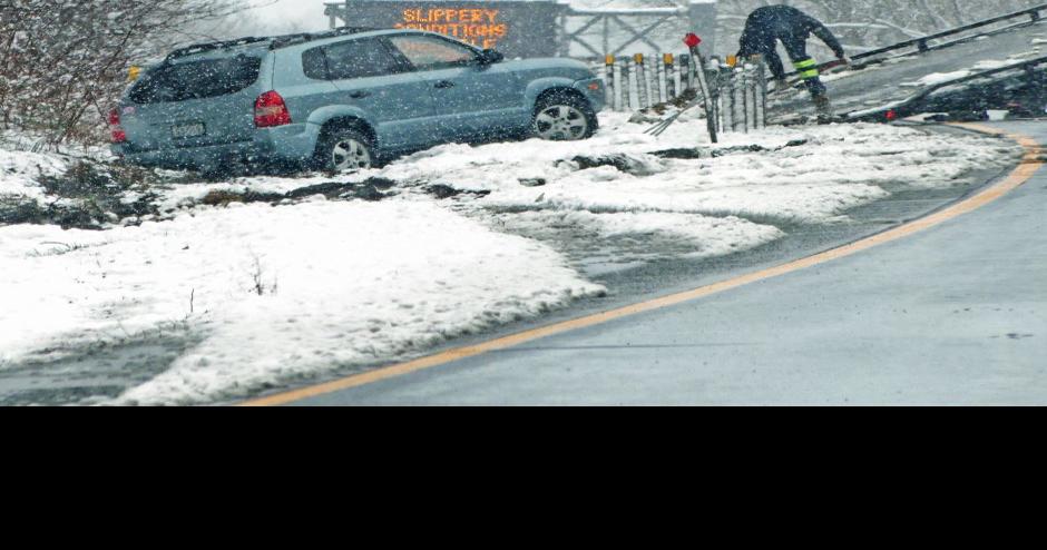 PHOTOS: Late-season storm blankets region with some early April snow ...