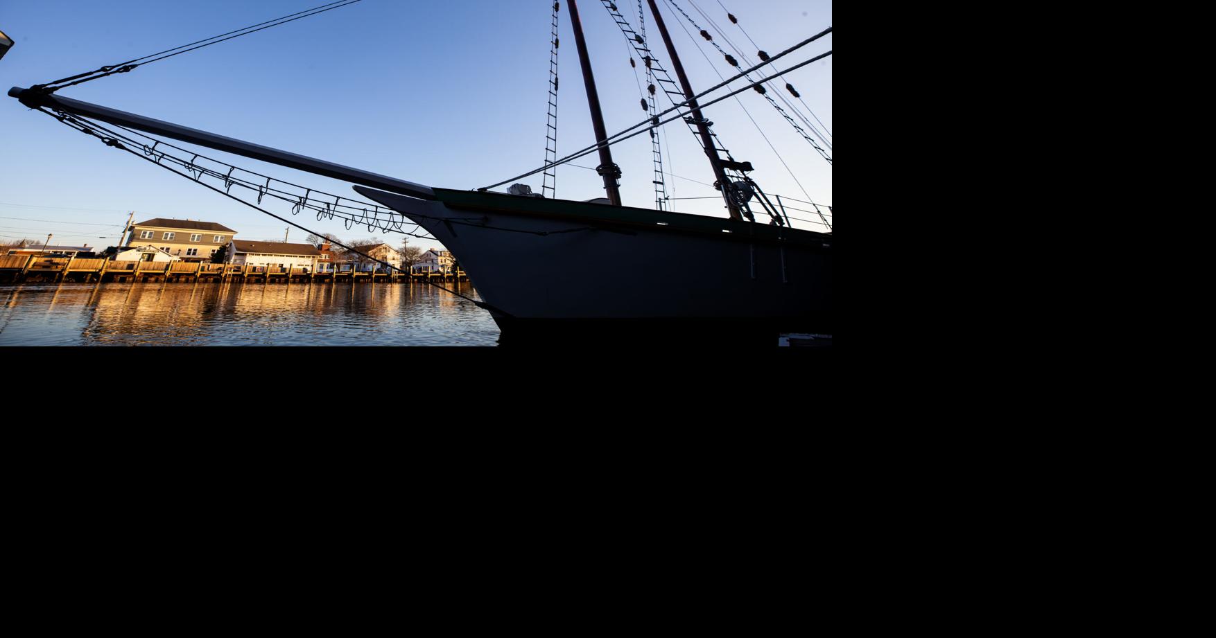 PHOTO Shadow of a ship docked in Mystic Stonington