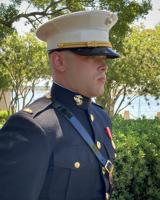U.S. Marine 2nd Lt. Nathan Crandall reports for duty