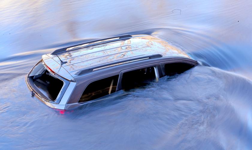 SUV goes into Pawcatuck River; firefighters rescue man from sinking