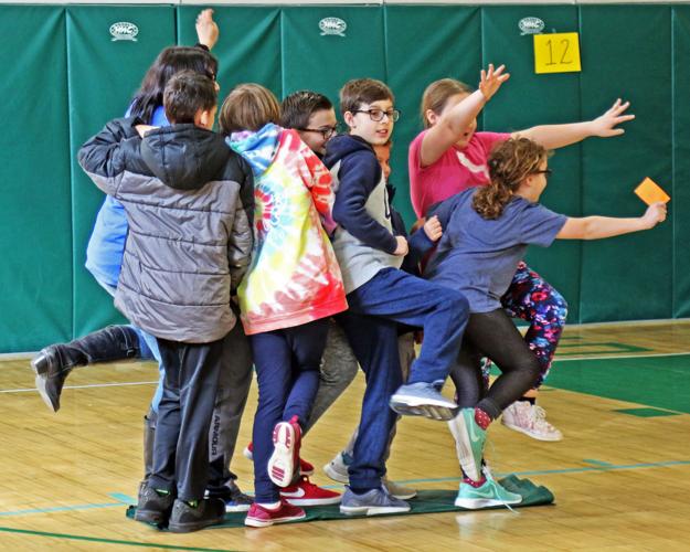 Out of their comfort zone Students from 2 middle schools engage in