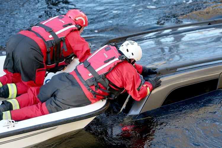 SUV goes into Pawcatuck River; firefighters rescue man from sinking