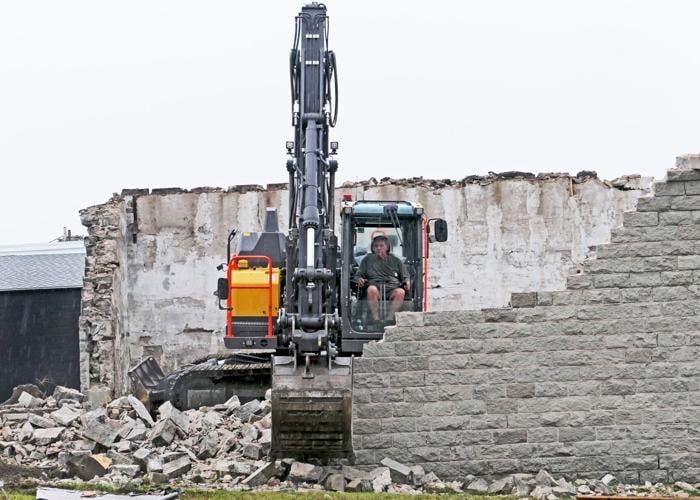 Westerly's 1884 granite building, formerly Hoxsie car dealer and Smith