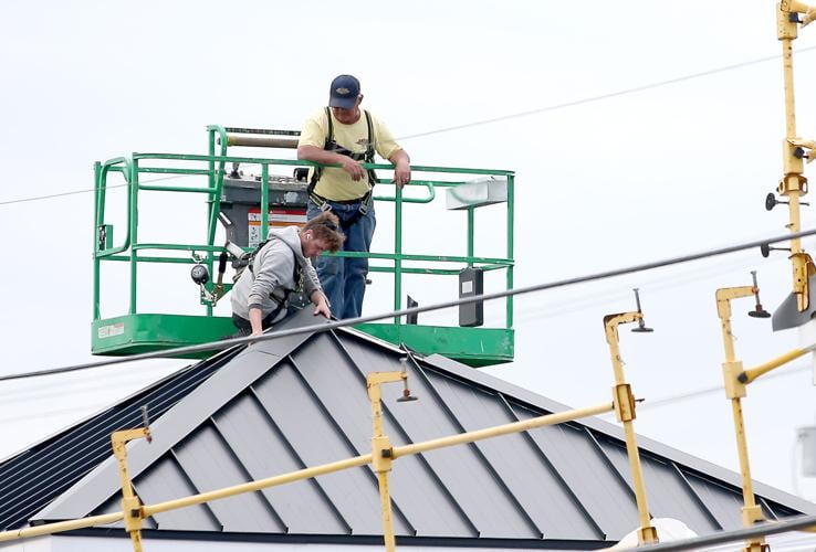 PHOTOS Working the roof at Riverhead Building Supply in Westerly