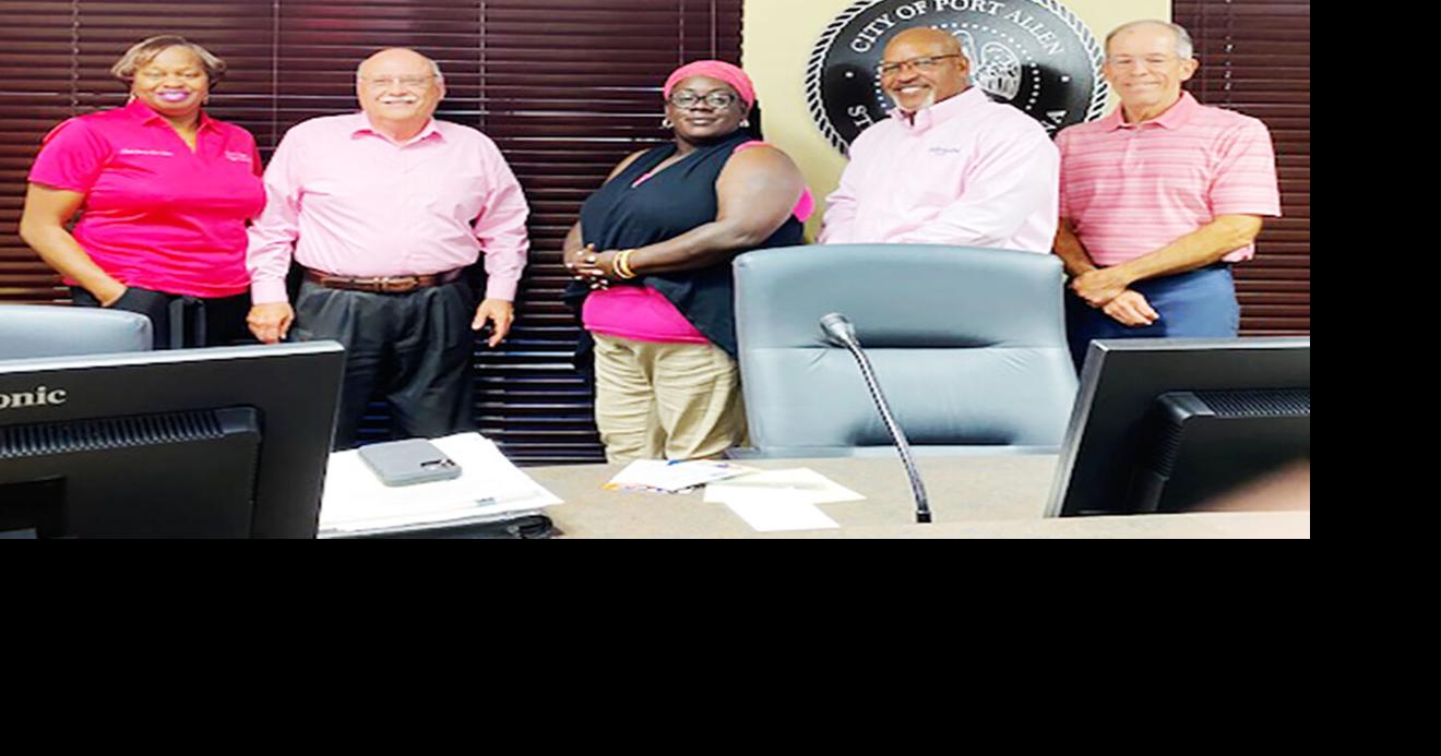 Mayor and City Council of Port Allen dressed in pink for the October