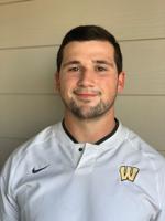 New wrestling coach embracing expectations