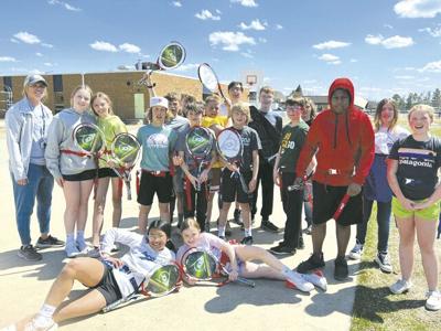 PE Instructors get tennis equipment