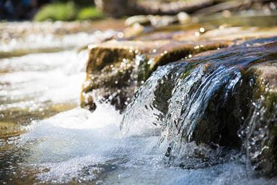 Water flowing in stream over rocks