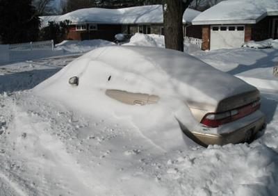 Parked Car Buried In Snow