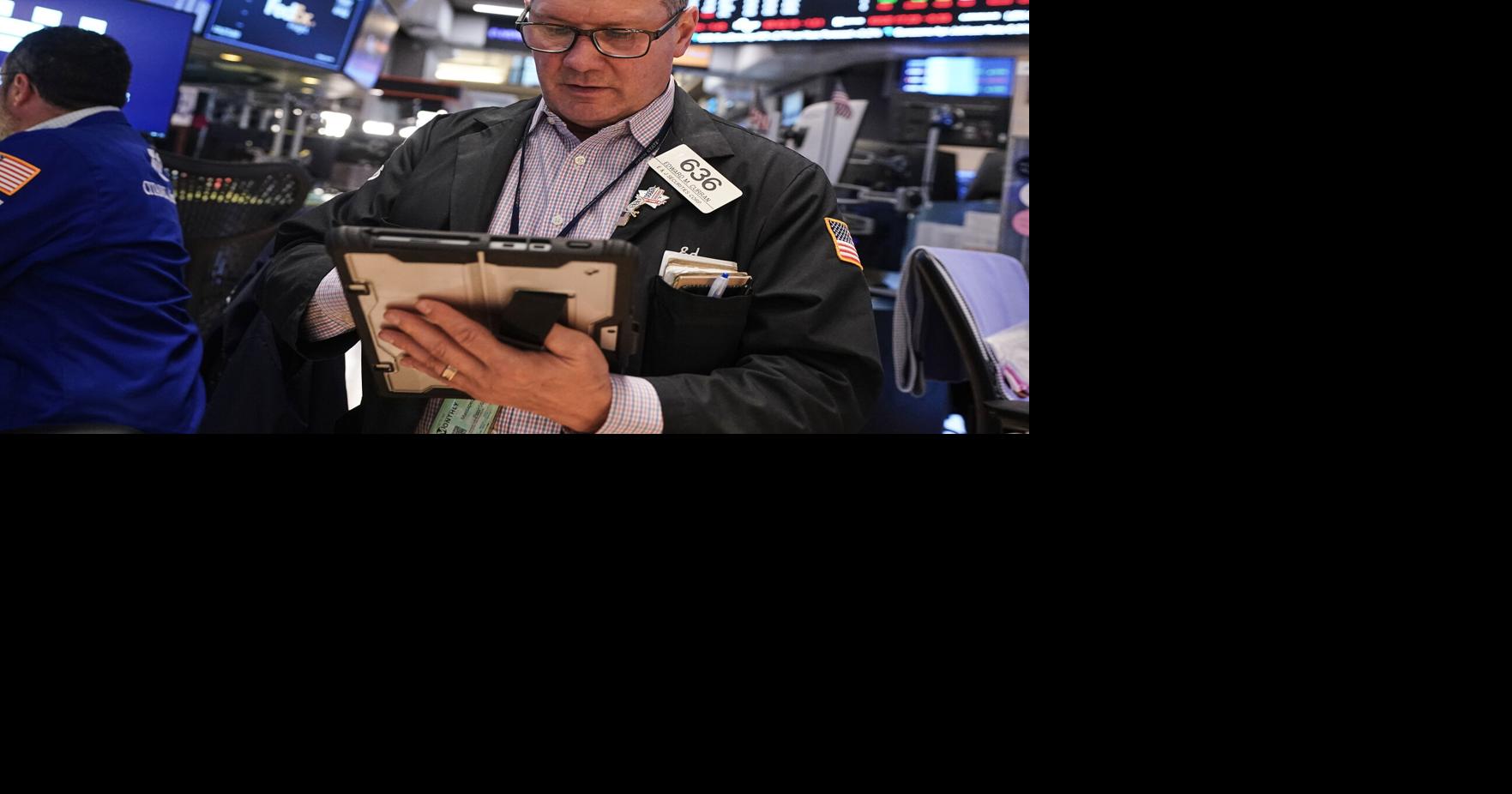 Stocks remain near record high despite oil prices rising