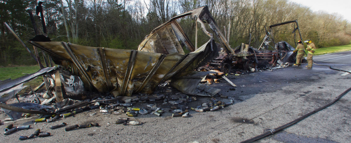 18-Wheeler burns 5
