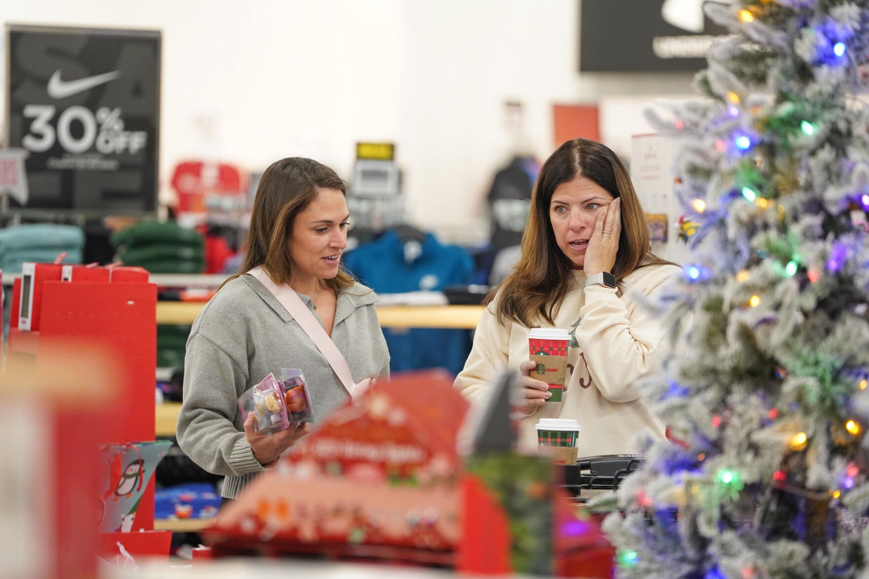 timesdaily.com - Anne D'Innocenzio Associated Press - Retailers watch Black Friday traffic for a holiday halo effect