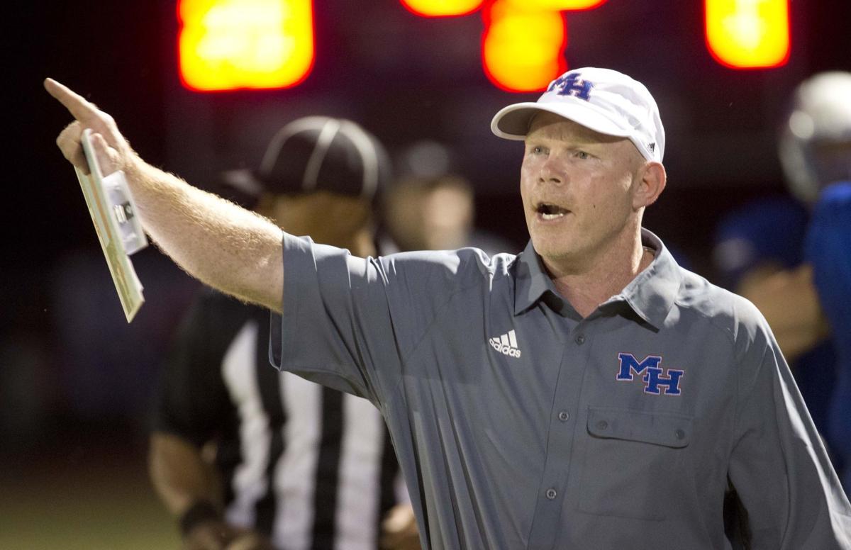 High School Football Darrell Higgins At Center Of Mars Hill S