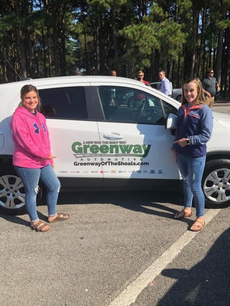 Dealership gives seven cars to Shoals area schools