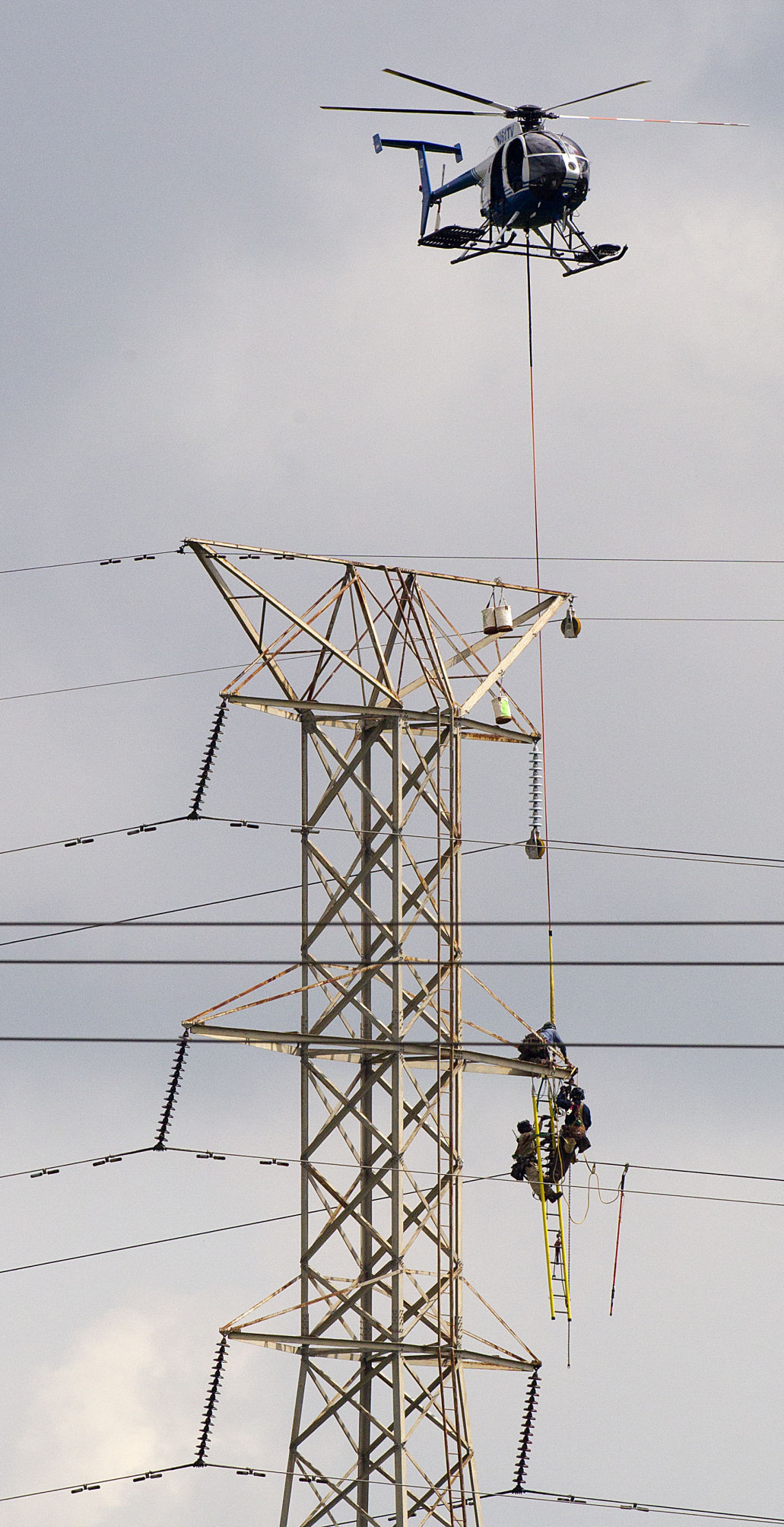 TVA pulls power lines across the Tennessee River and local power outage
