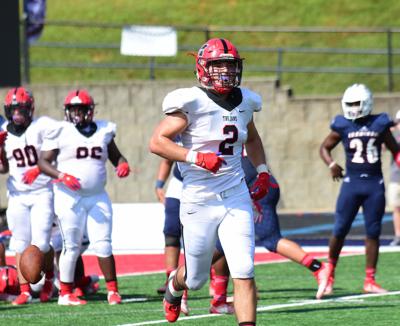 Jackson Bratton football Muscle Shoals warmup (copy)