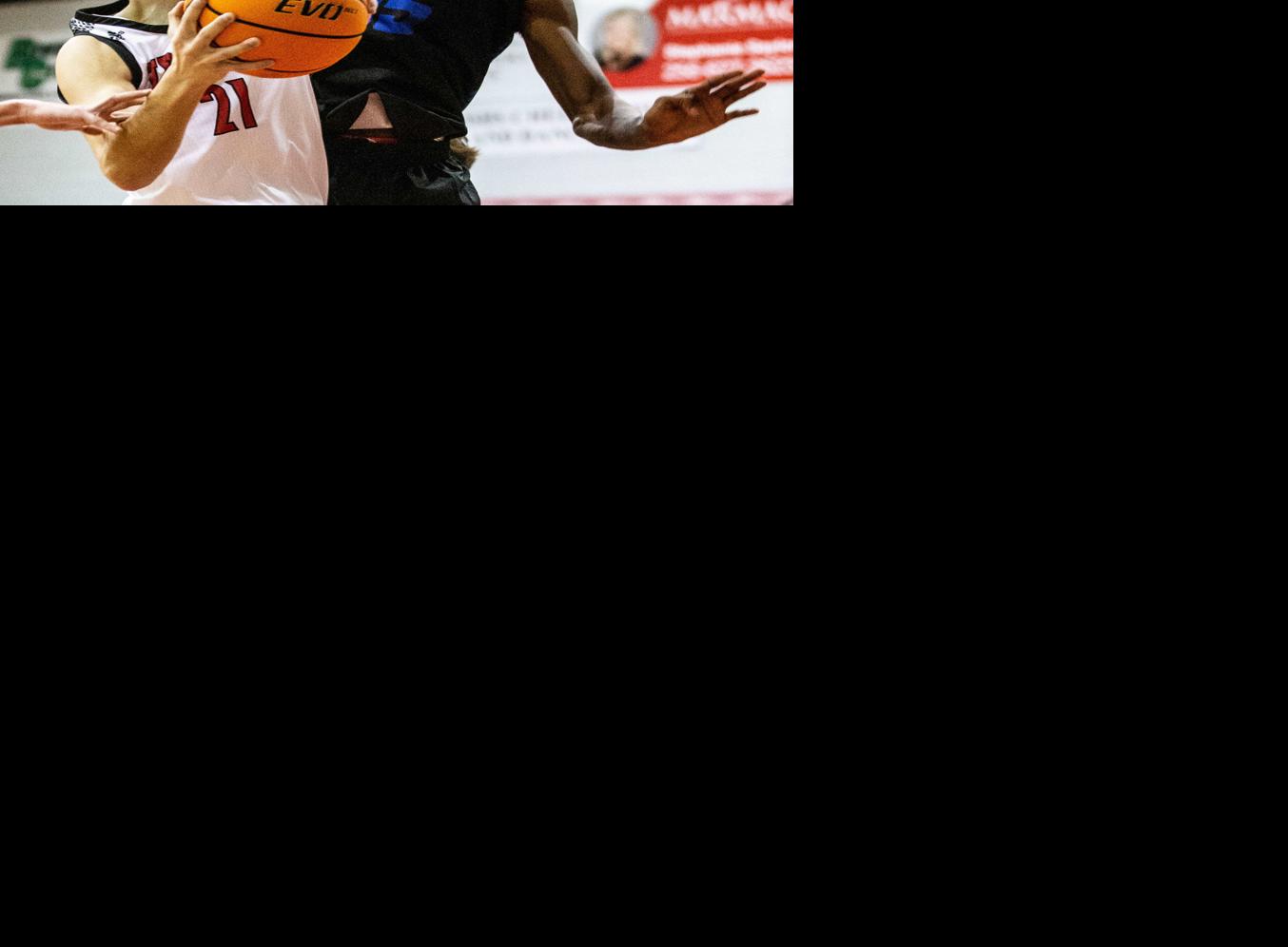 TimesDaily.com - In season debut, Muscle Shoals boys beat Florence in overtime image