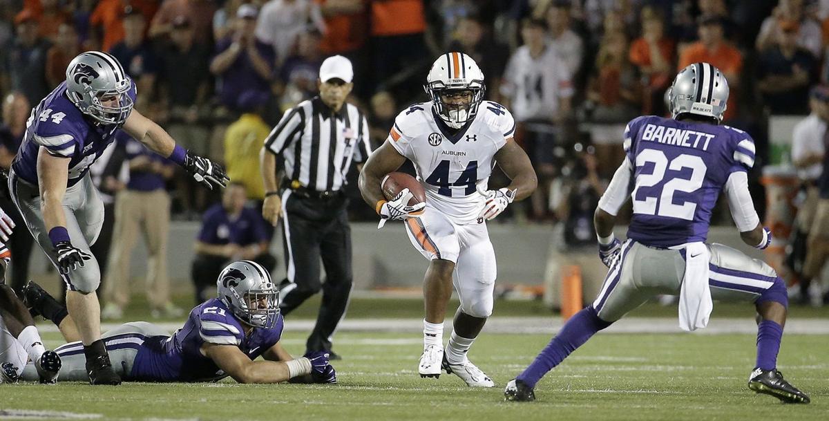 Auburn holds off Kansas St. 2014 Sports