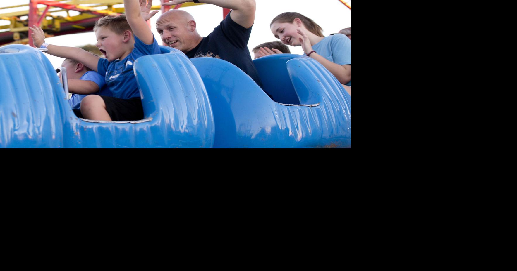 Children enjoy the kiddie rides at the North Alabama State Fair ...