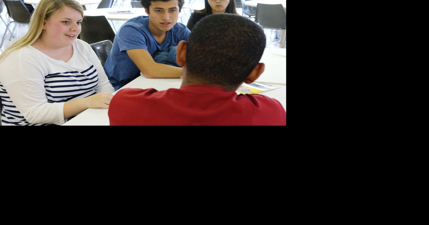 Conversation partners encourage student interaction | Education ...