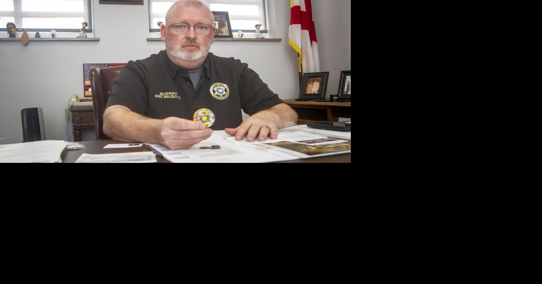 Sheriff's challenge coins raising funds for autism awareness
