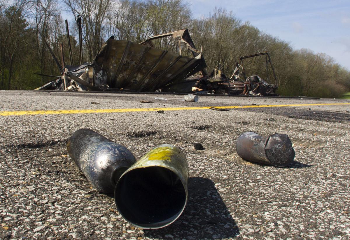 18-Wheeler burns 4