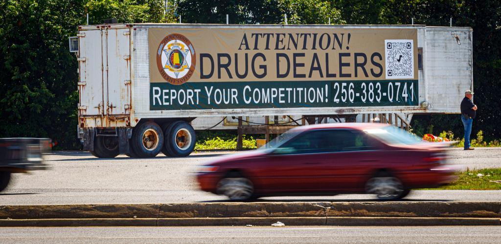 Sign invites dealers to report competition | Local News 