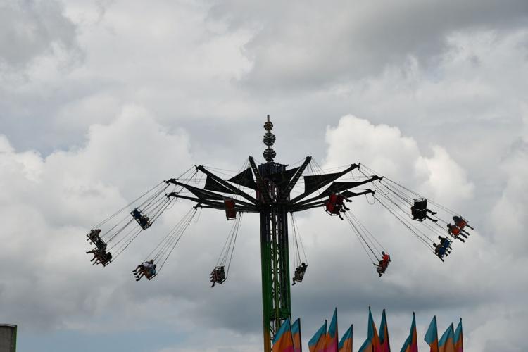 Silhouettes ride at the fair