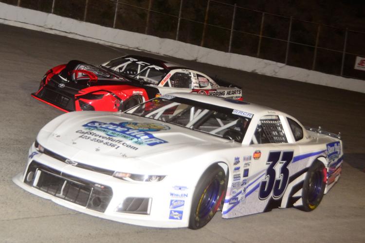 33 bruce crumbley 1 zeke shell race race into turn 4.jpg