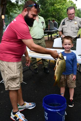Youth Fishing Derby participant catches something other than a fish, Local  News