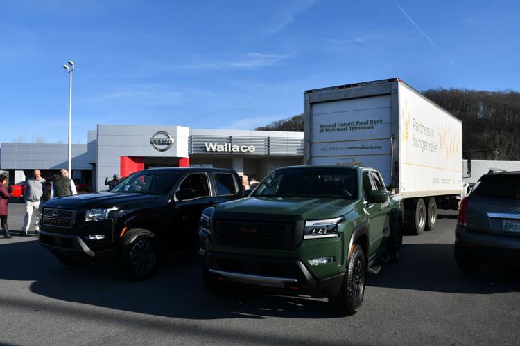 Wallace Nissan Mitsubishi donate trucks of food to Second Harvest, Fill